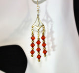 swarovski red magma crystals and brass chandelier earringswith gold filled ear wires