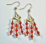 swarovski red magma crystals and brass chandelier earringswith gold filled ear wires