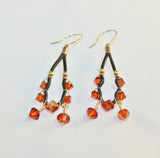 red magma swarovski crystals and black leather gold filled earrings