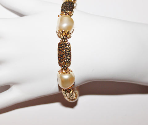 swarovski pale gold baroque crystal pearls and gold plated bracelet