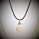 mother of pearl and sterling teardrop pendant on black leather cord