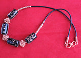 lampwork beads with copper swirls and copper beads on black leather cord