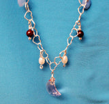 long textured silver heart chain with multi colored swarovski crystals and beads