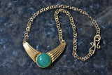 bronze festoon pendant with green agate cabochon on bronze chain necklace