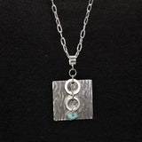 square silver embossed pendant with sterling and amazonite