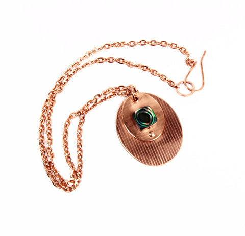 textured copper pendant with abalone on copper chain